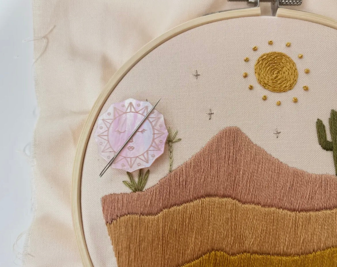 Sun Needle Minder